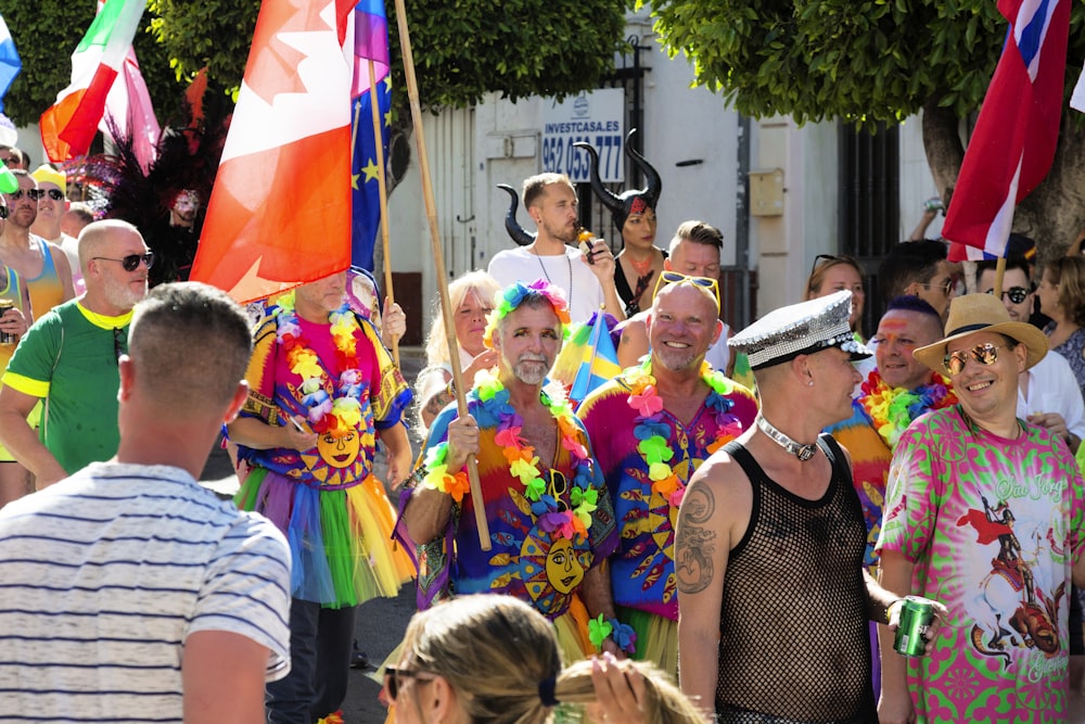 group of people standing on street during daytime