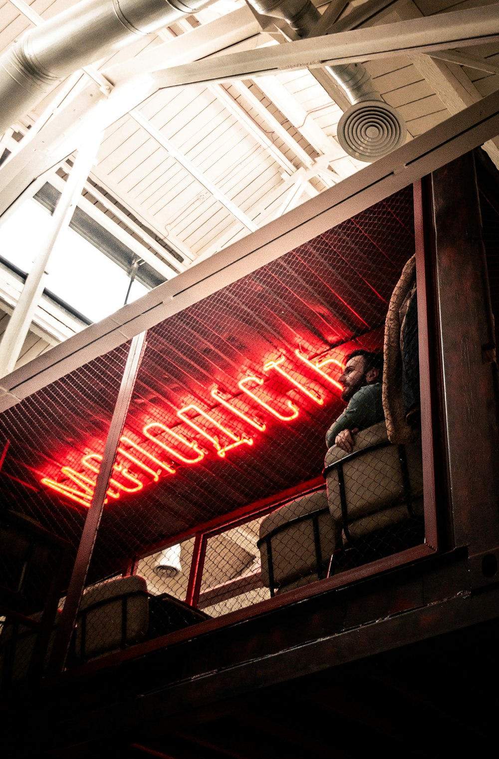 red and white neon light signage