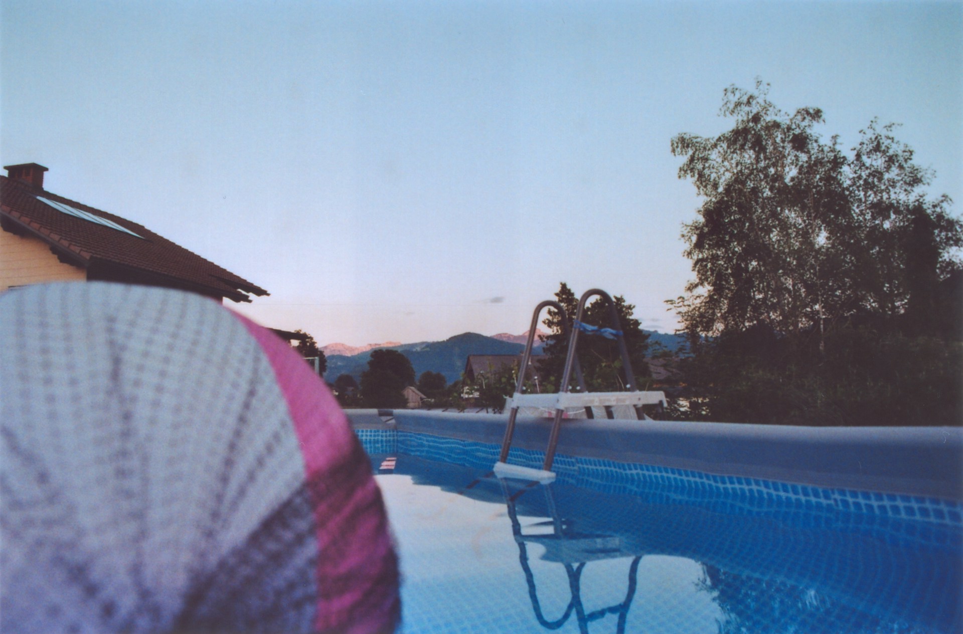 woman wearing yellow long-sleeved dress under white clouds and blue sky during daytime