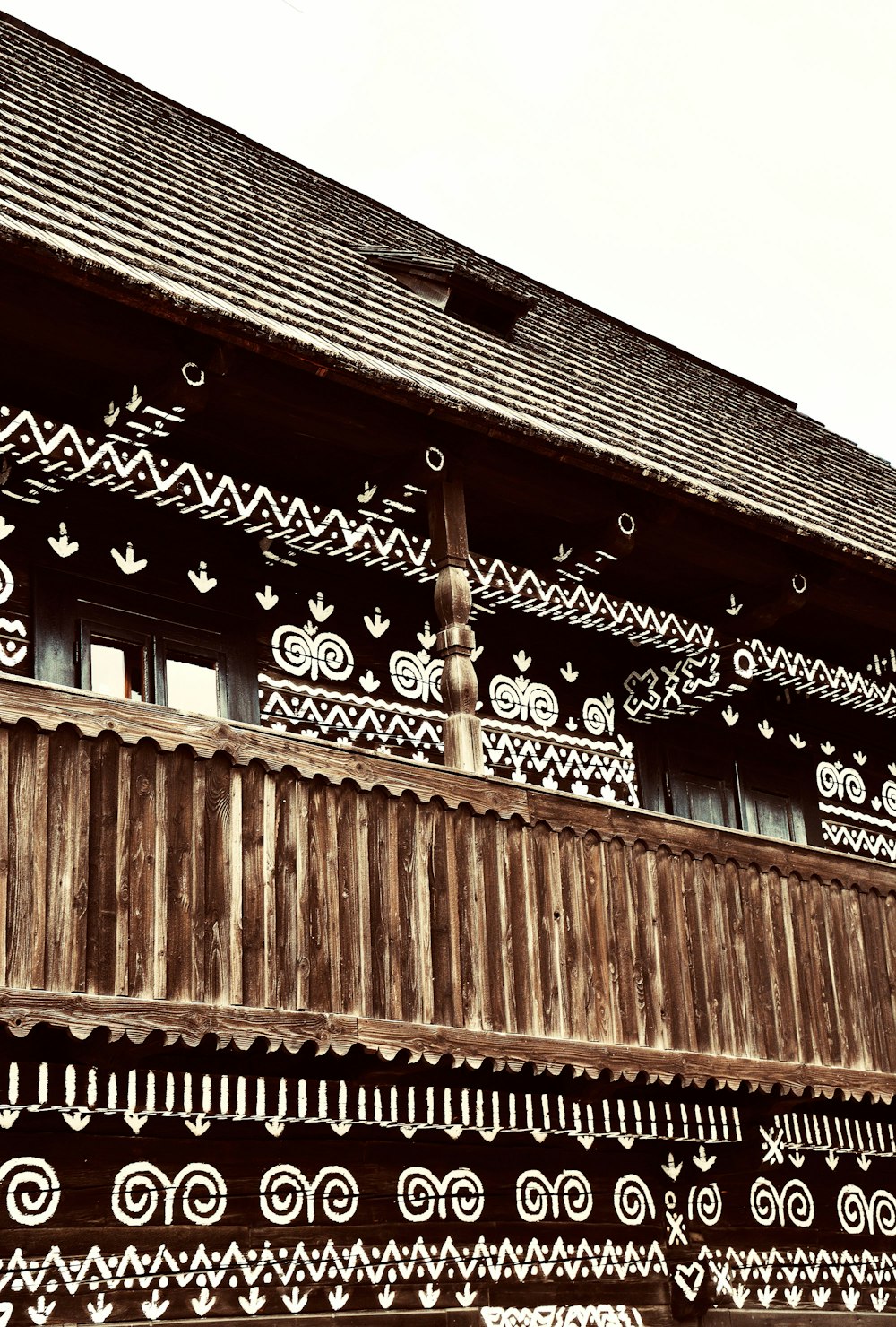 brown wooden building under white sky during daytime