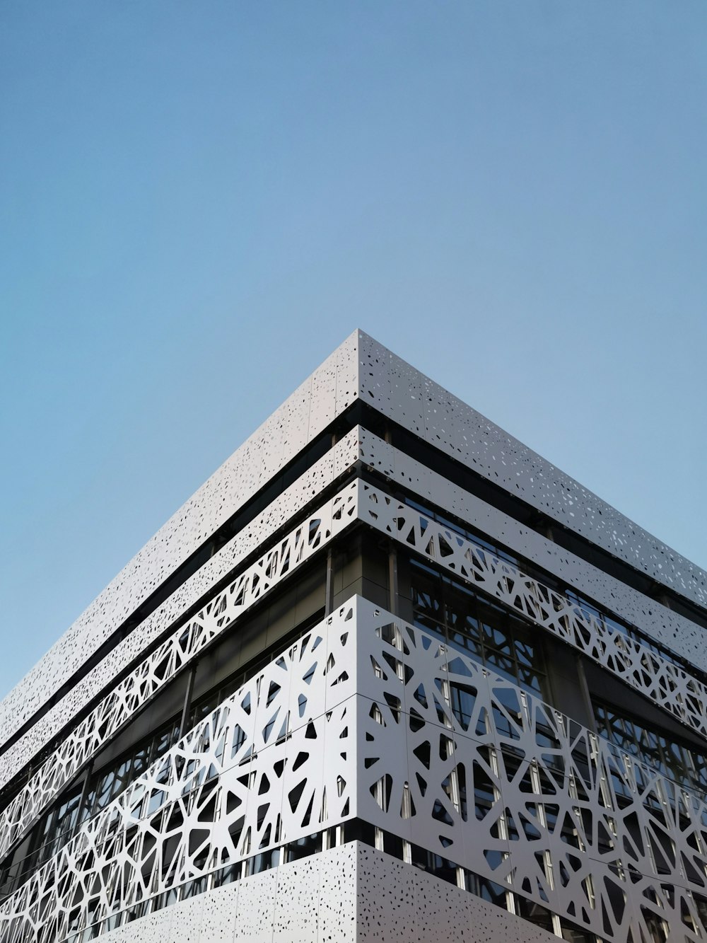 white concrete building under blue sky during daytime