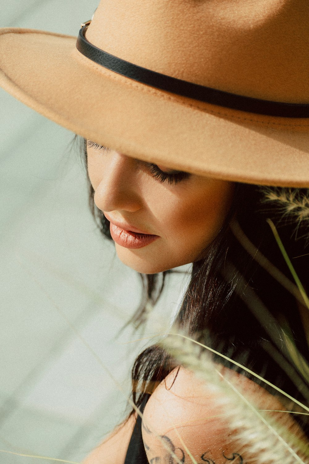 woman in brown sun hat