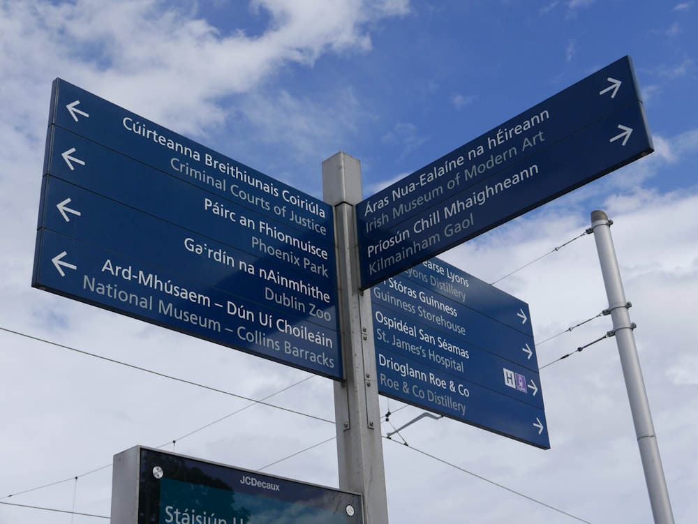 blue and white street sign