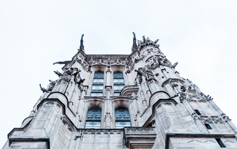 low angle photography of gray concrete building