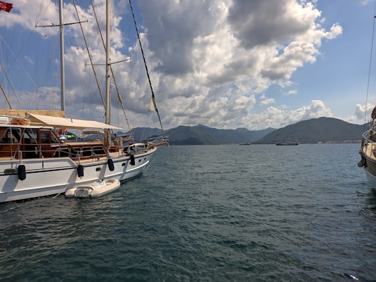 white boat on sea during daytime in Marmaris Turkey