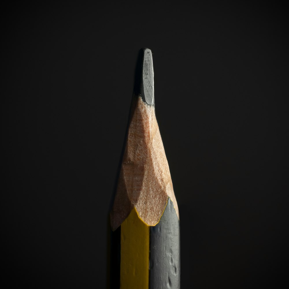 black pencil on black background