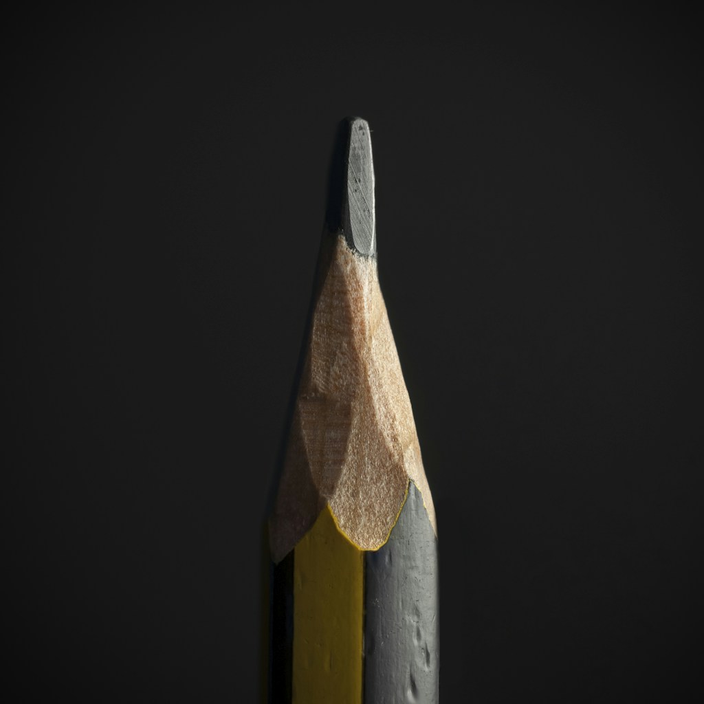 black pencil on black background