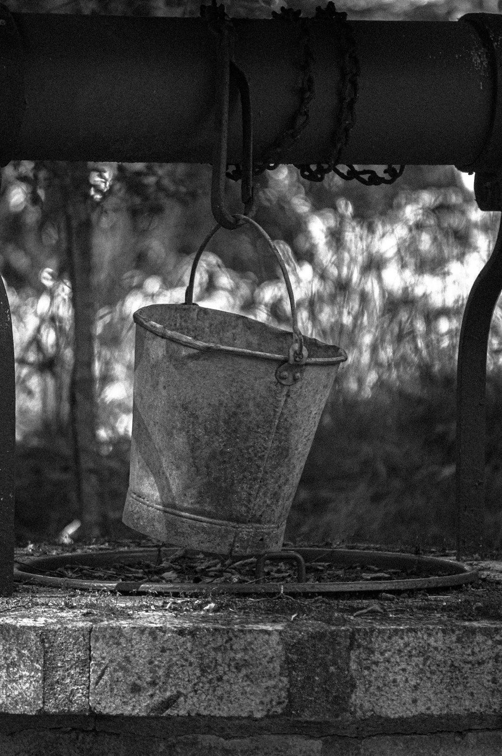 gray scale photo of bucket