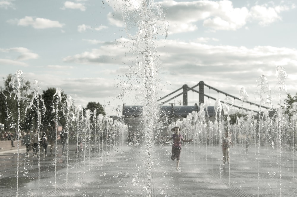 water fountain under blue sky during daytime