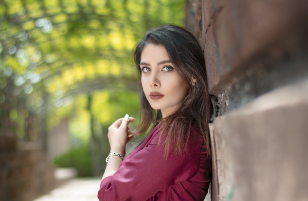 woman in purple long sleeve shirt