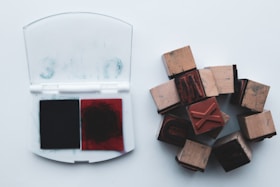A close-up of various stamps and ink pads.