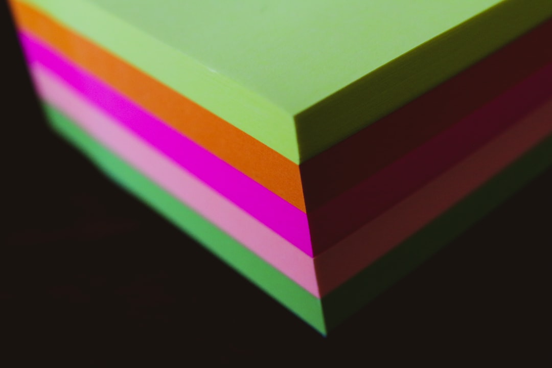 green yellow and pink colored paper