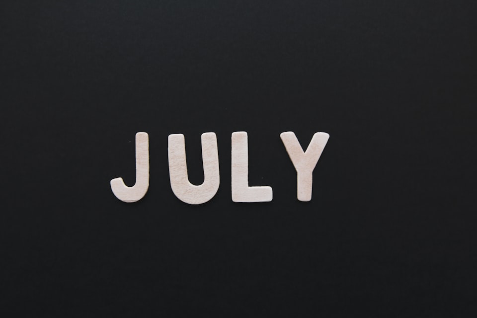 JULY spelled out in letters 