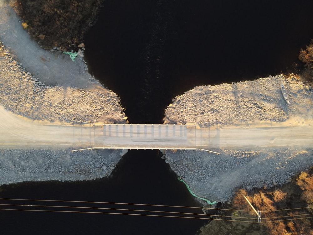 brown wooden bridge over river