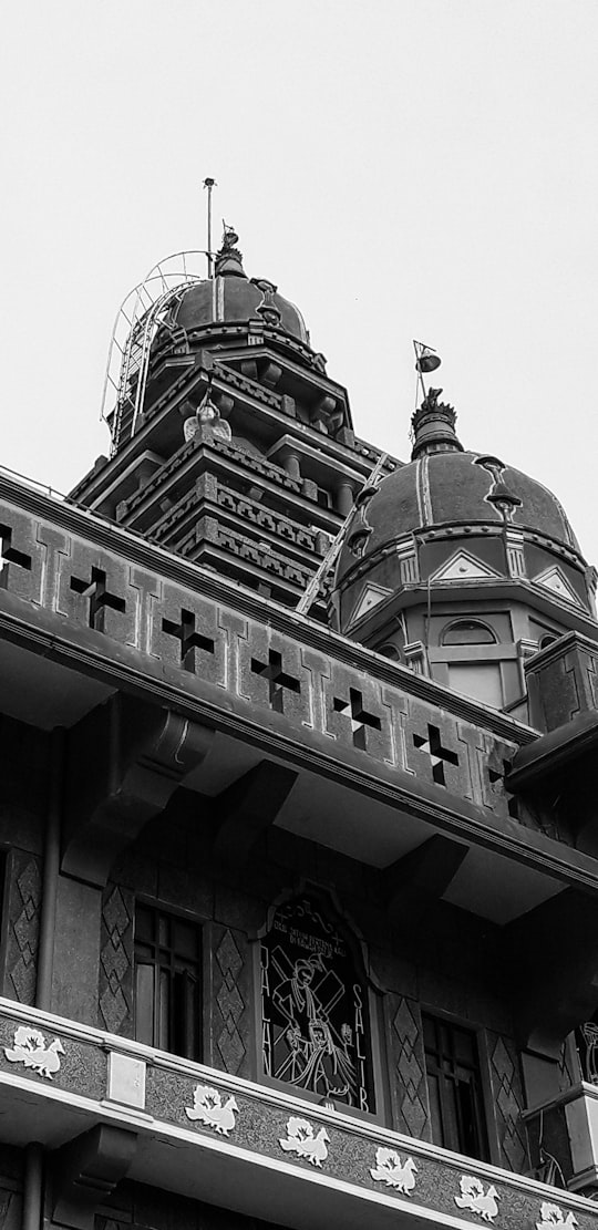 gray concrete building during daytime in Graha Maria Annai Velangkanni Indonesia