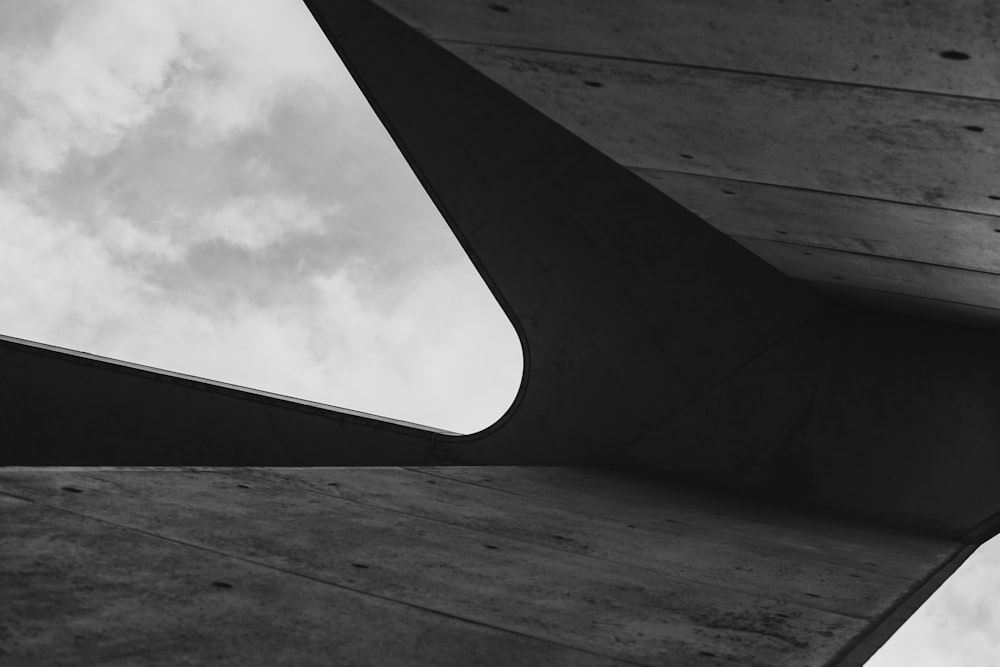 grayscale photo of a concrete building