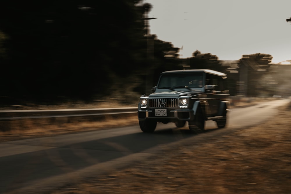 black jeep wrangler on road during daytime