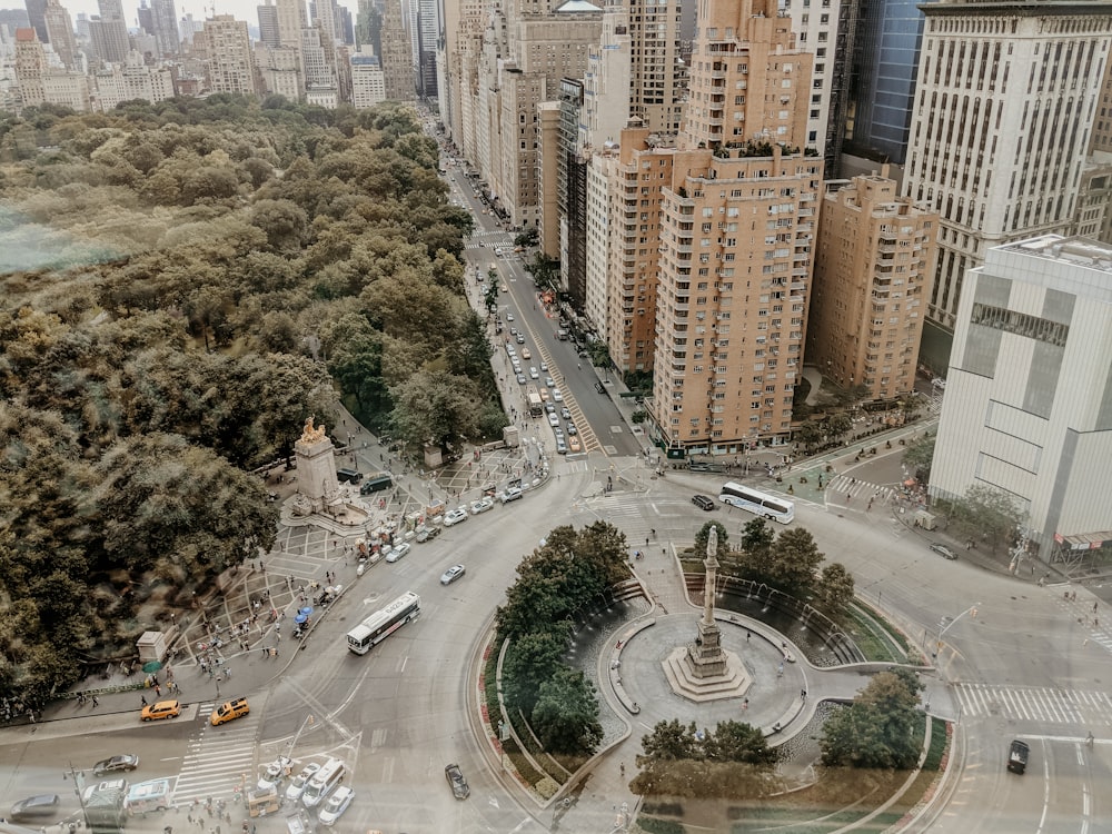 an aerial view of a city with tall buildings