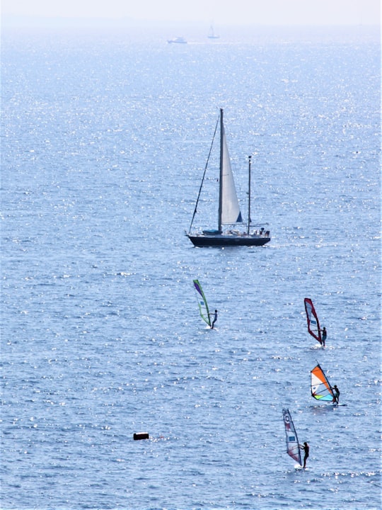 white sail boat on sea during daytime in Bodrum Turkey