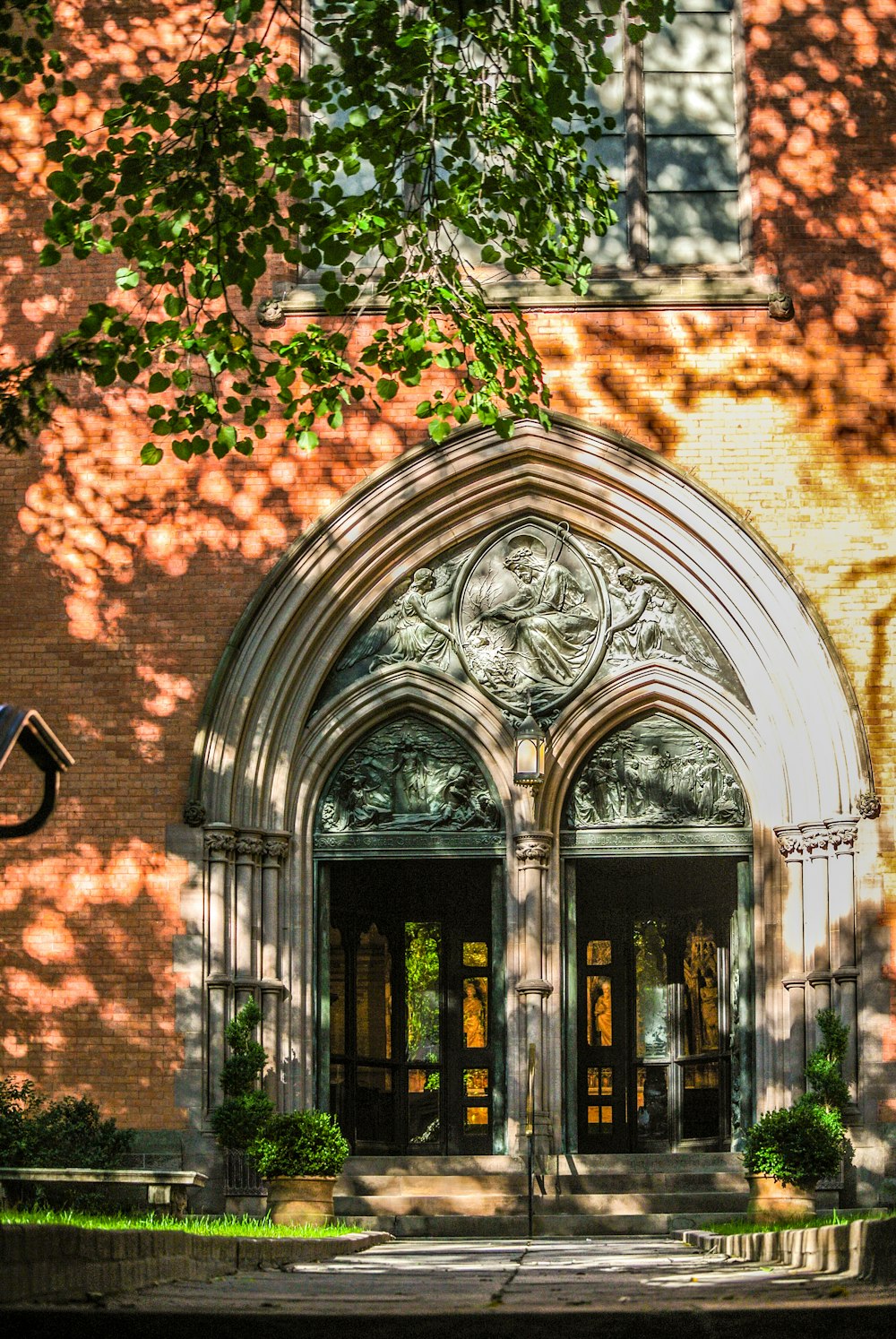 brown brick building with glass windows