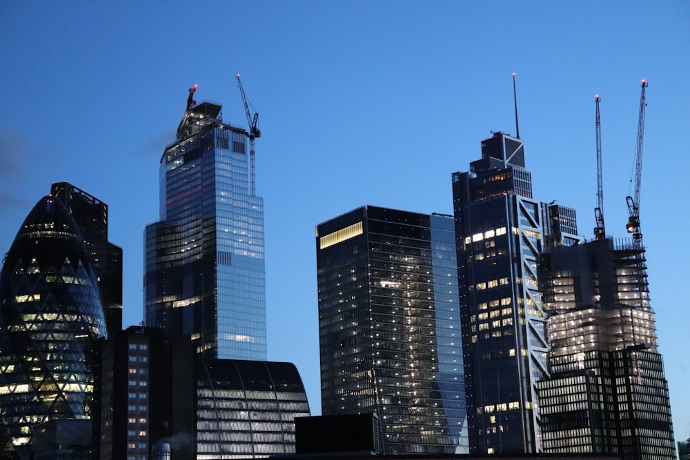 man in black jacket standing on top of building during night time