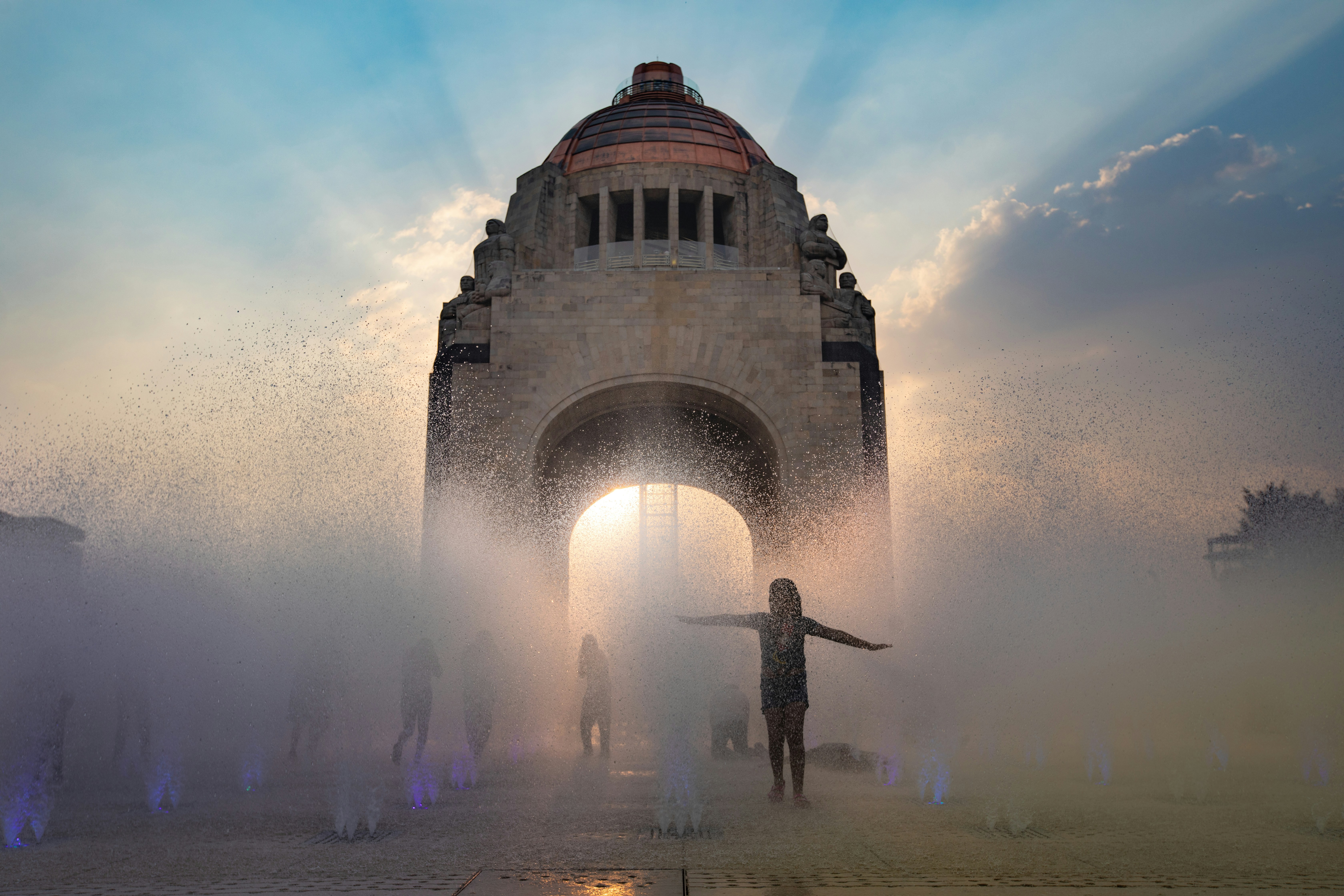 people standing near brown concrete building during daytime