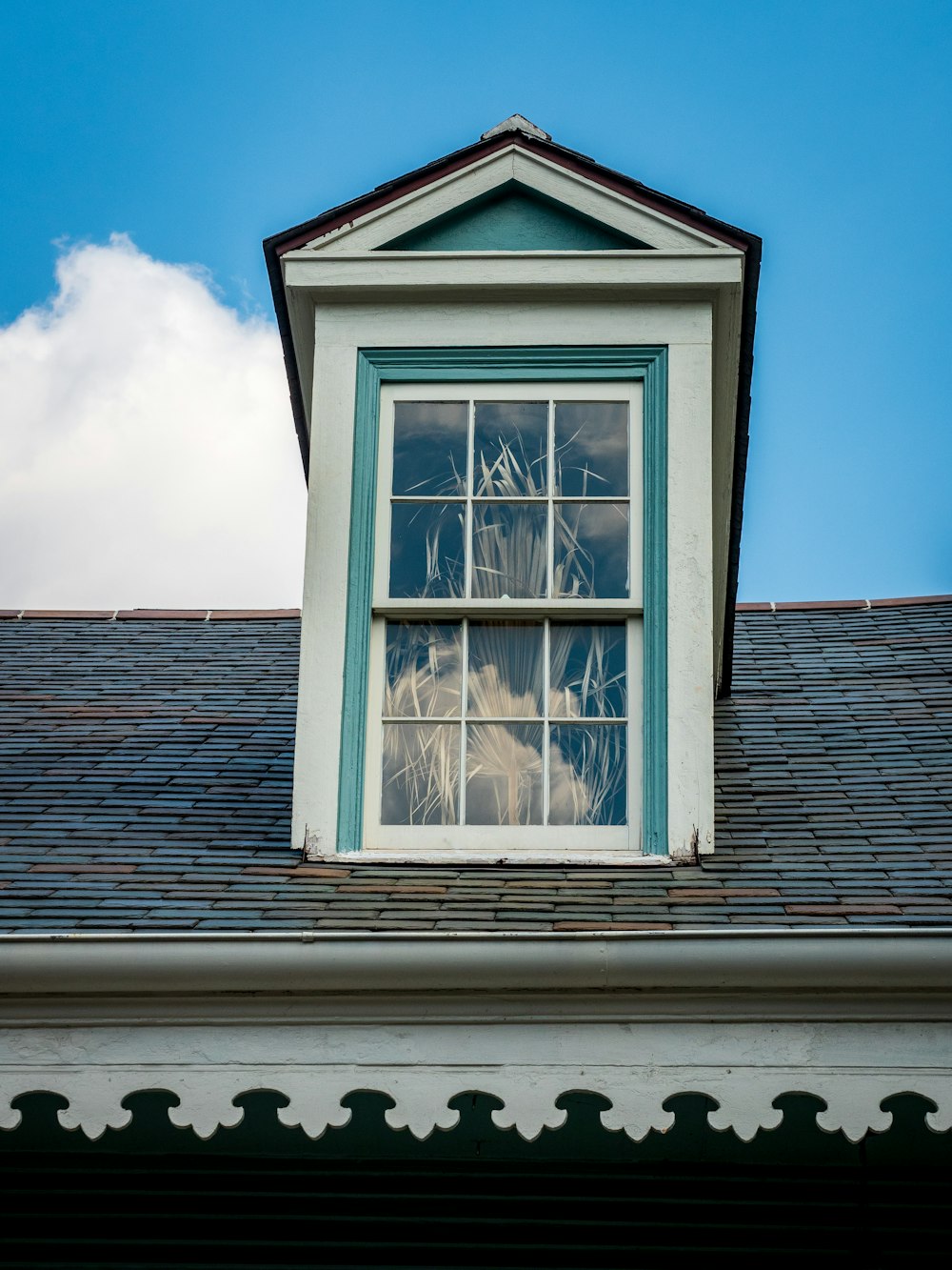 white wooden framed glass window