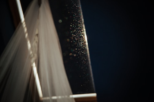 Close-up of a sleek mirror panel featuring Specchio Art’s reflective design.