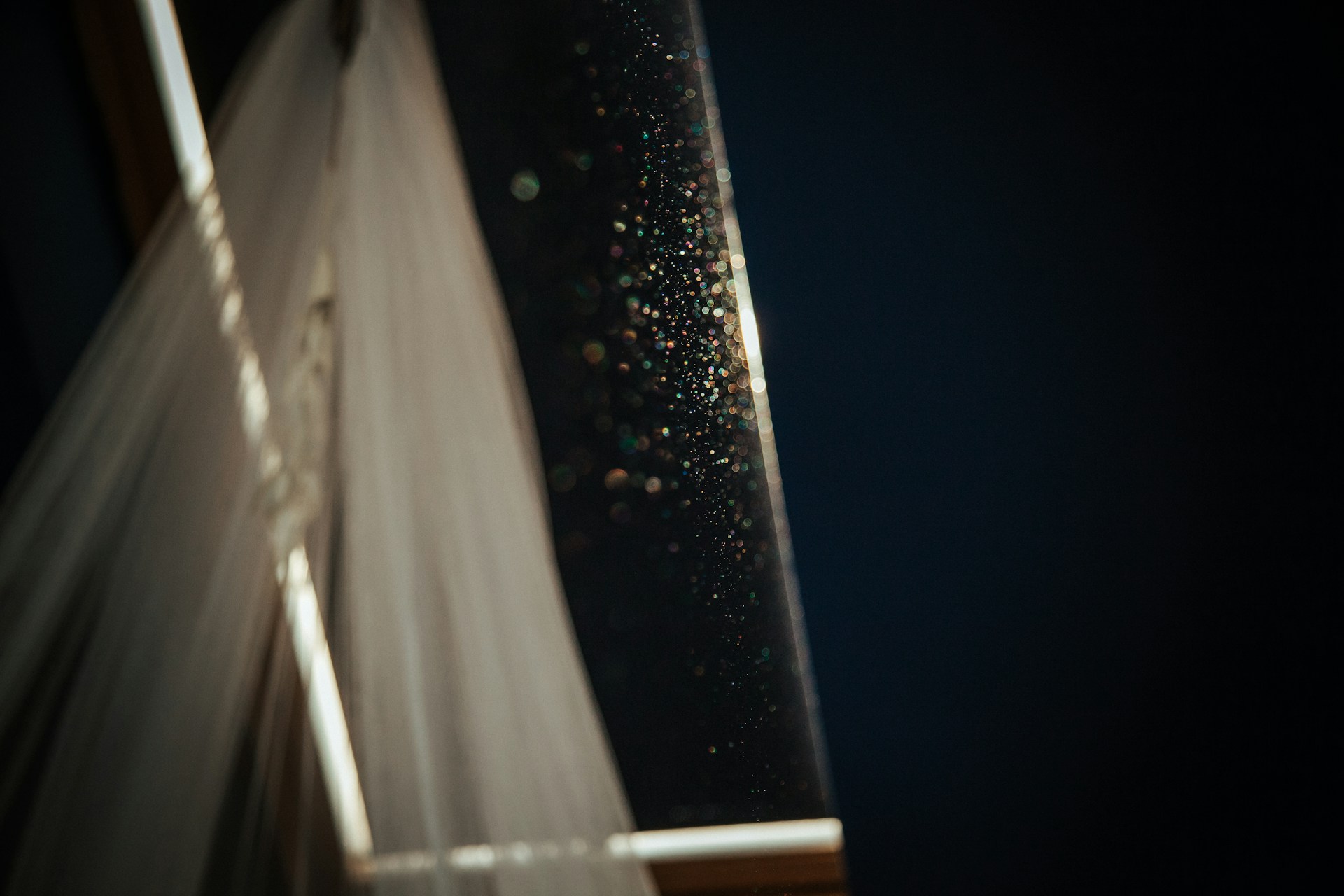 woman wearing yellow long-sleeved dress under white clouds and blue sky during daytime