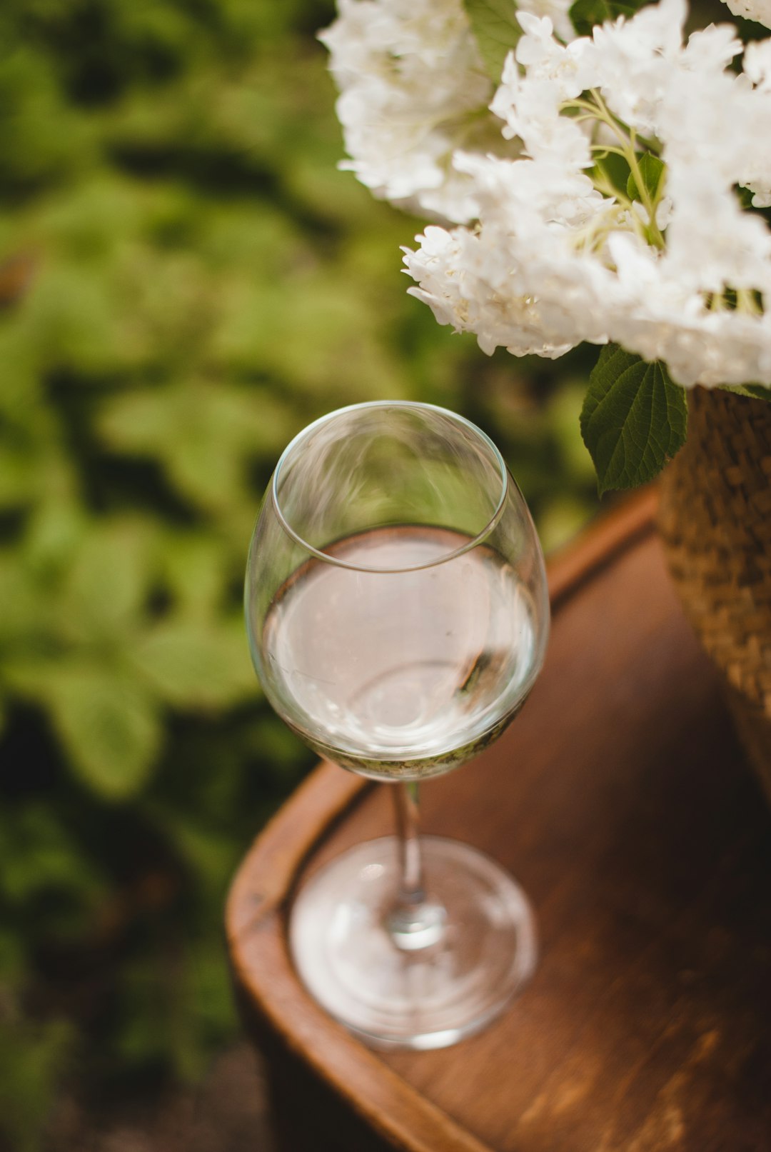 white flower on clear glass vase