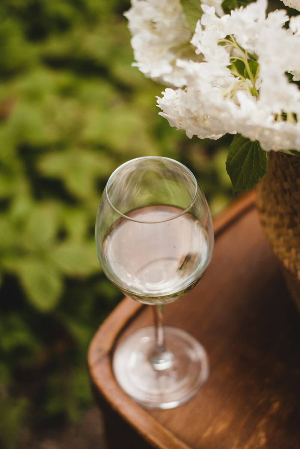 white flower on clear glass vase