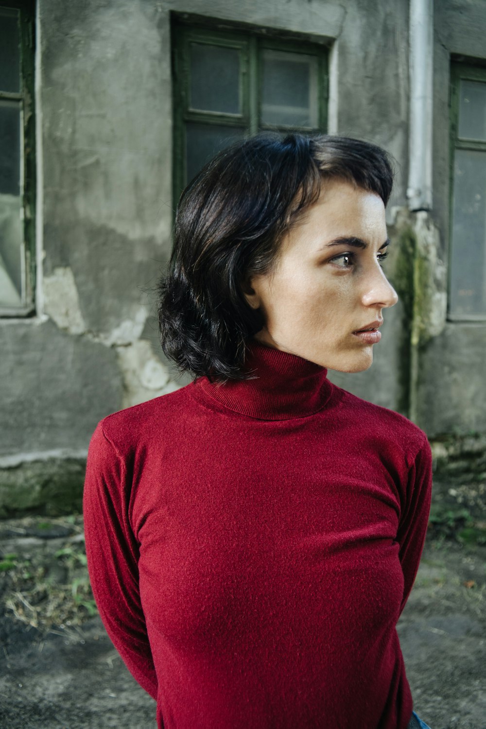 woman in red turtleneck sweater