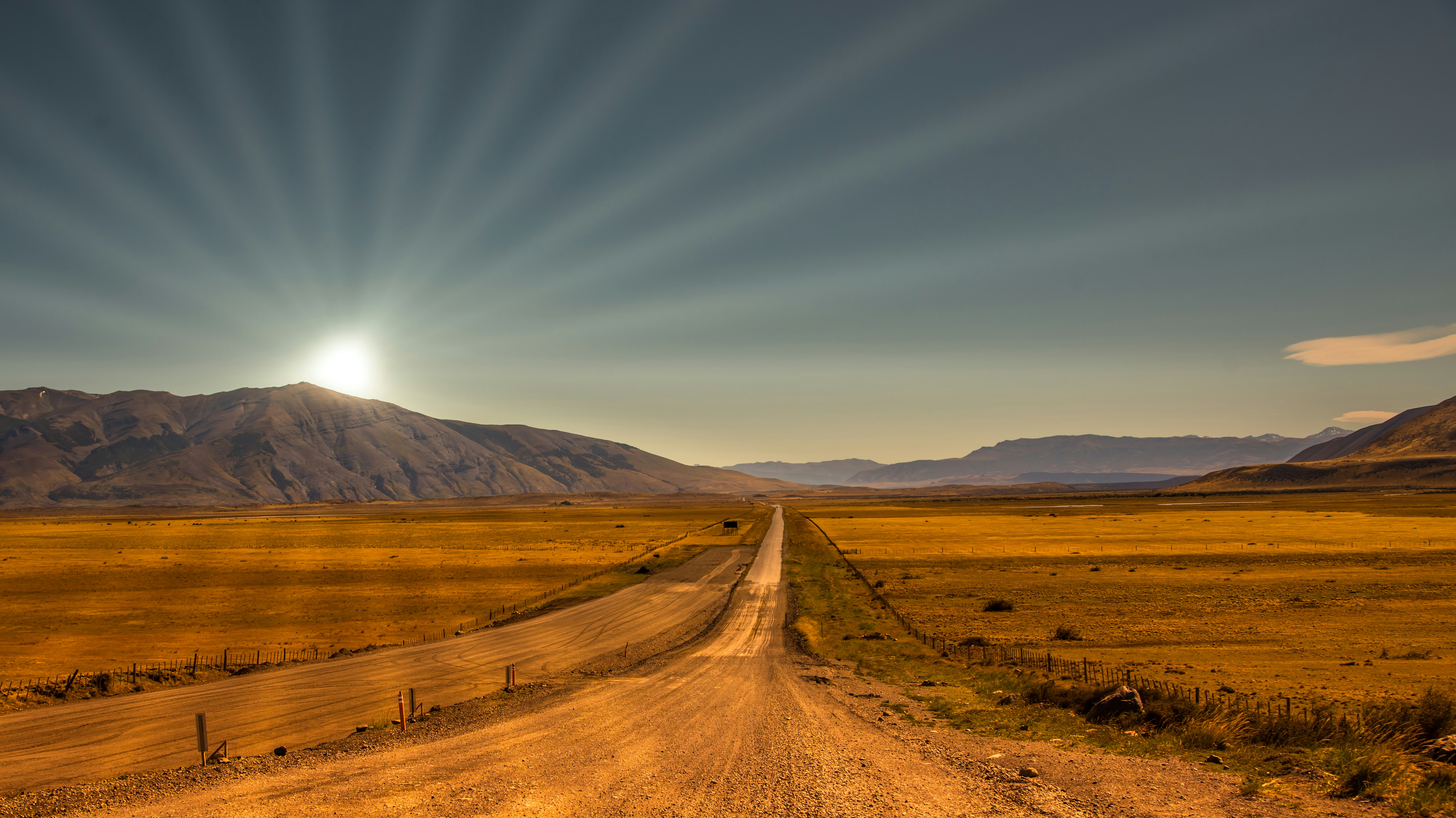 brown field near brown mountain under blue sky during daytime, Sandroad to the horizon</p><p>