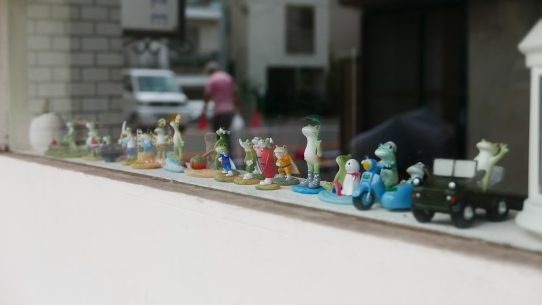 blue and white plastic toys on white table