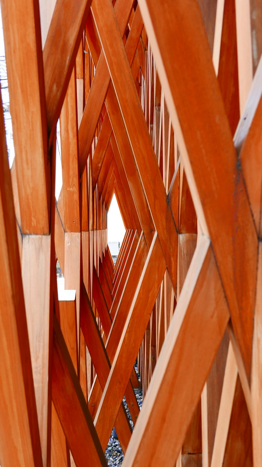 brown wooden frame on white wall