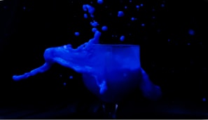 Artistic shot of black clothing with fine liquid glass menu effects overlay