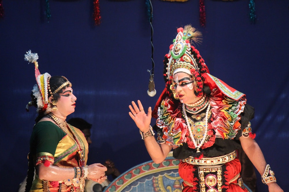 woman in red and gold traditional dress