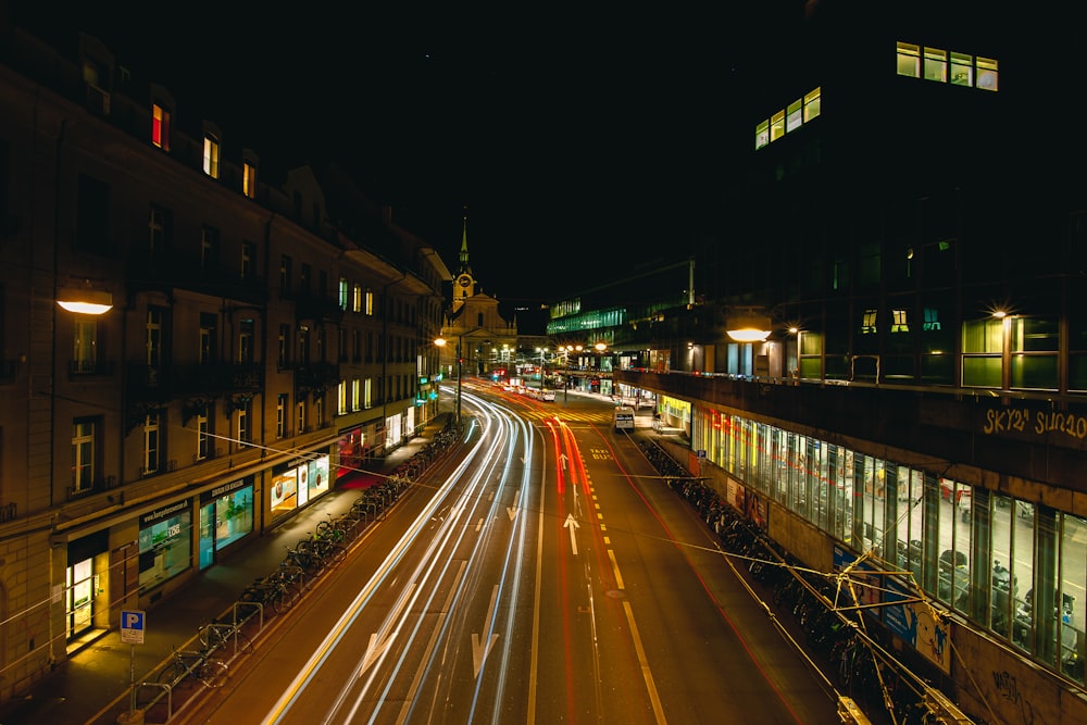 time lapse photography of cars on road during night time