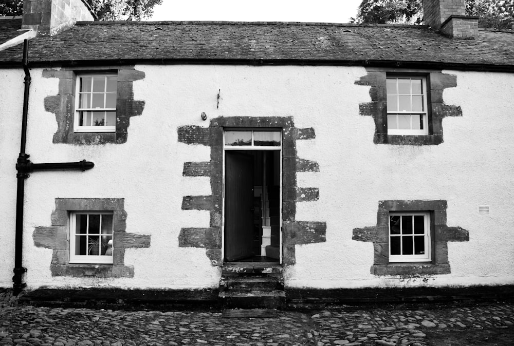 grayscale photo of concrete building