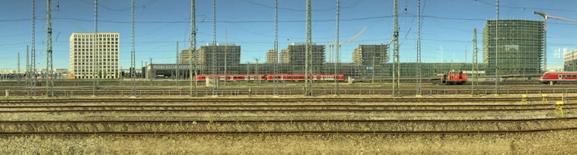 A panoramic view of a bustling railway yard with trains.