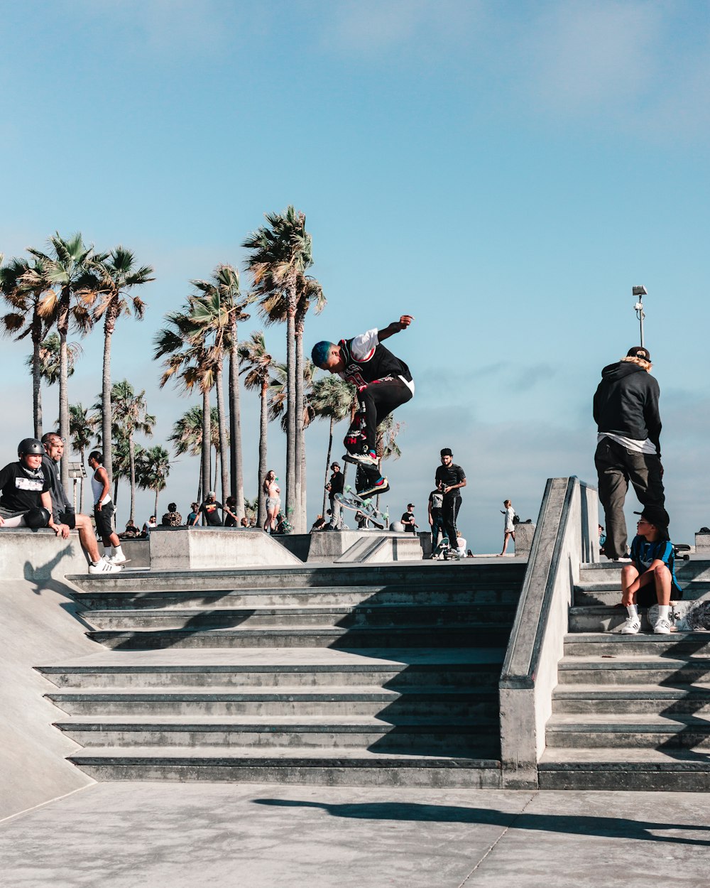 people walking on concrete stairs during daytime