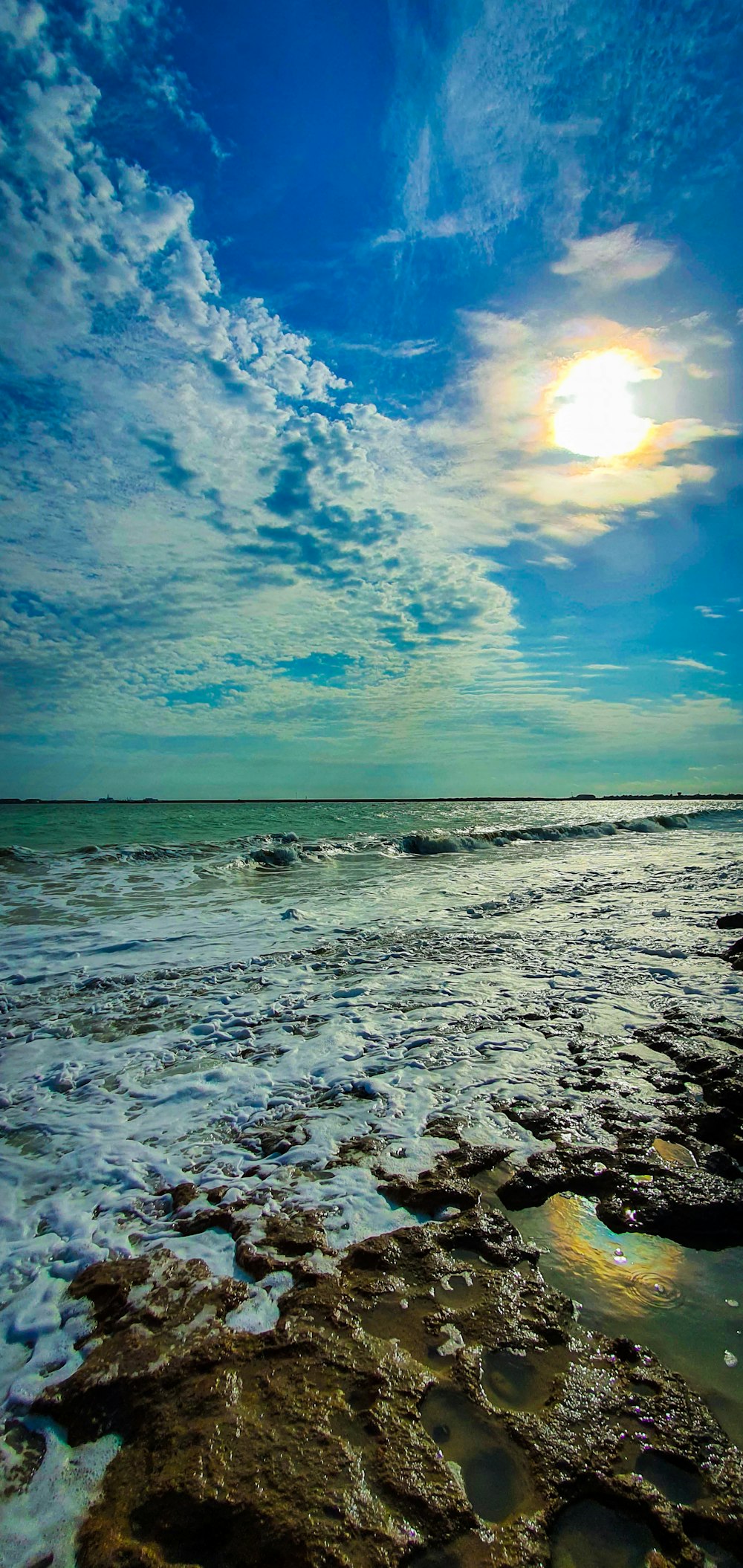 blue sky and white clouds over sea