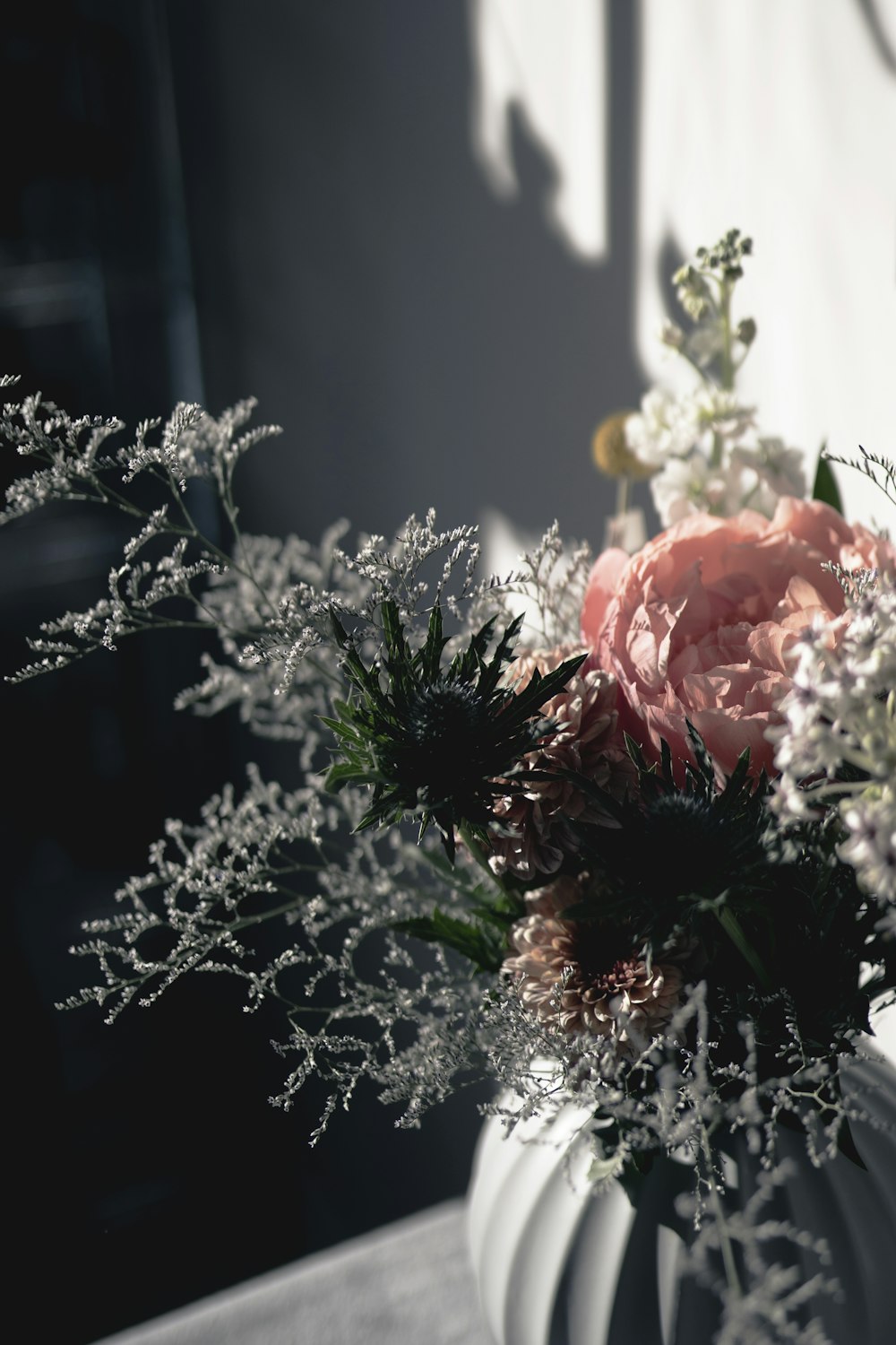 pink roses and white babys breath flowers