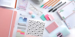 pink sticky notes on white paper