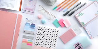 pink sticky notes on white paper