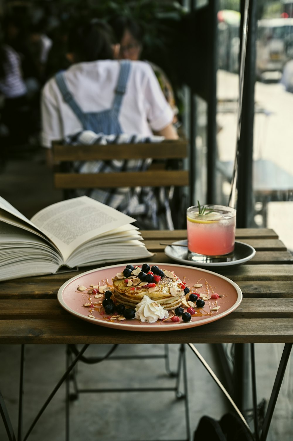 white ceramic plate on brown wooden table