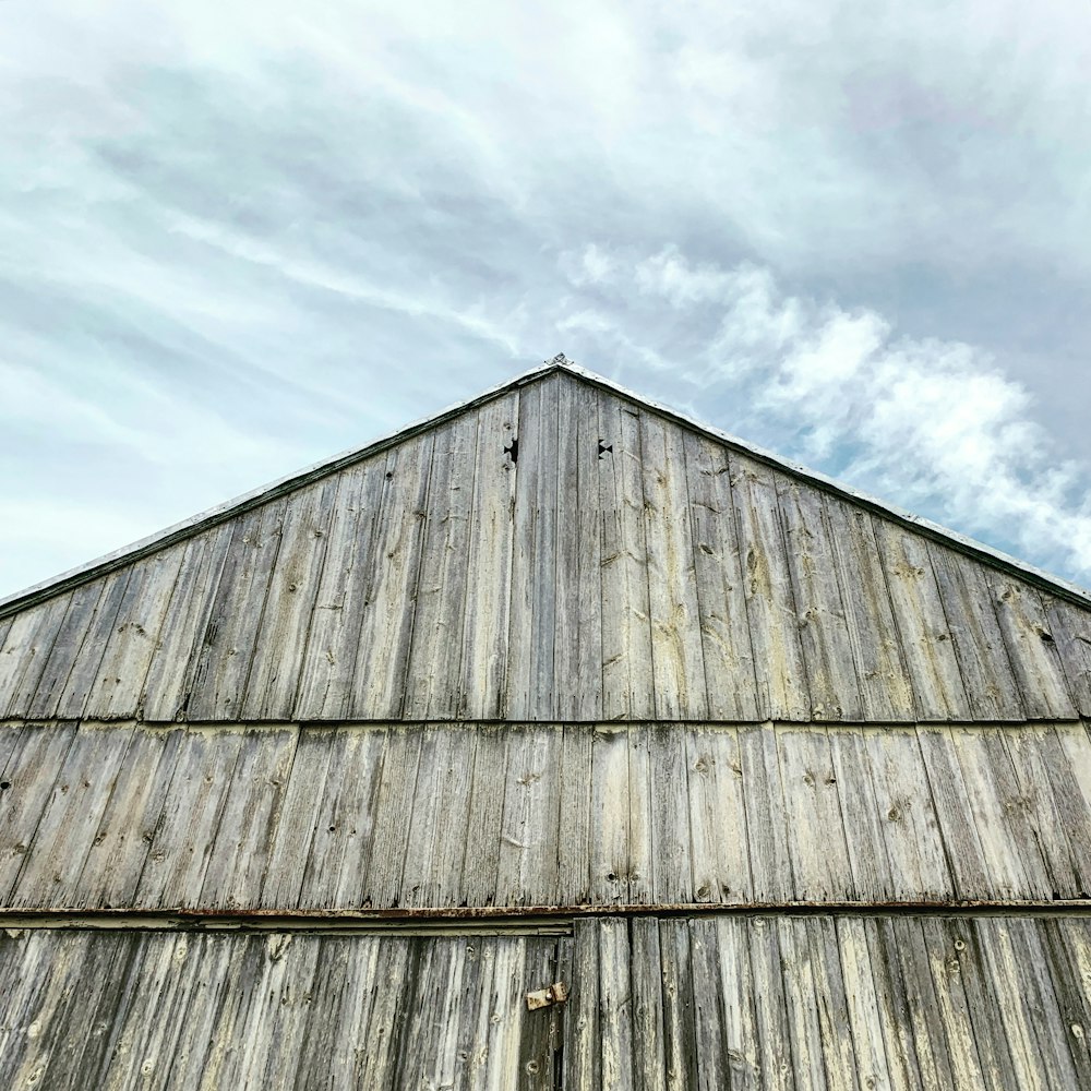 brown wooden house under blue sky during daytime