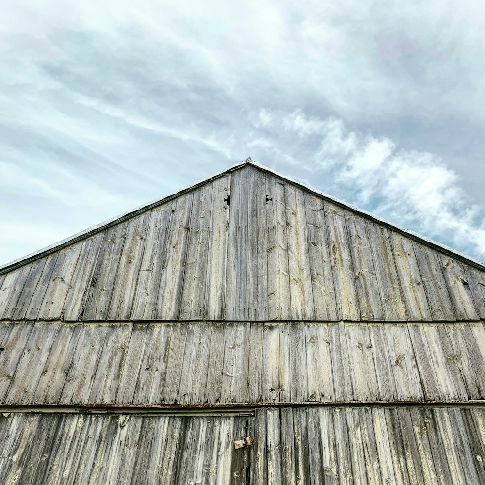 white and red house on gray concrete wall photo – Free Outdoors Image on Unsplash Photo by Sándor Bányai on Unsplash