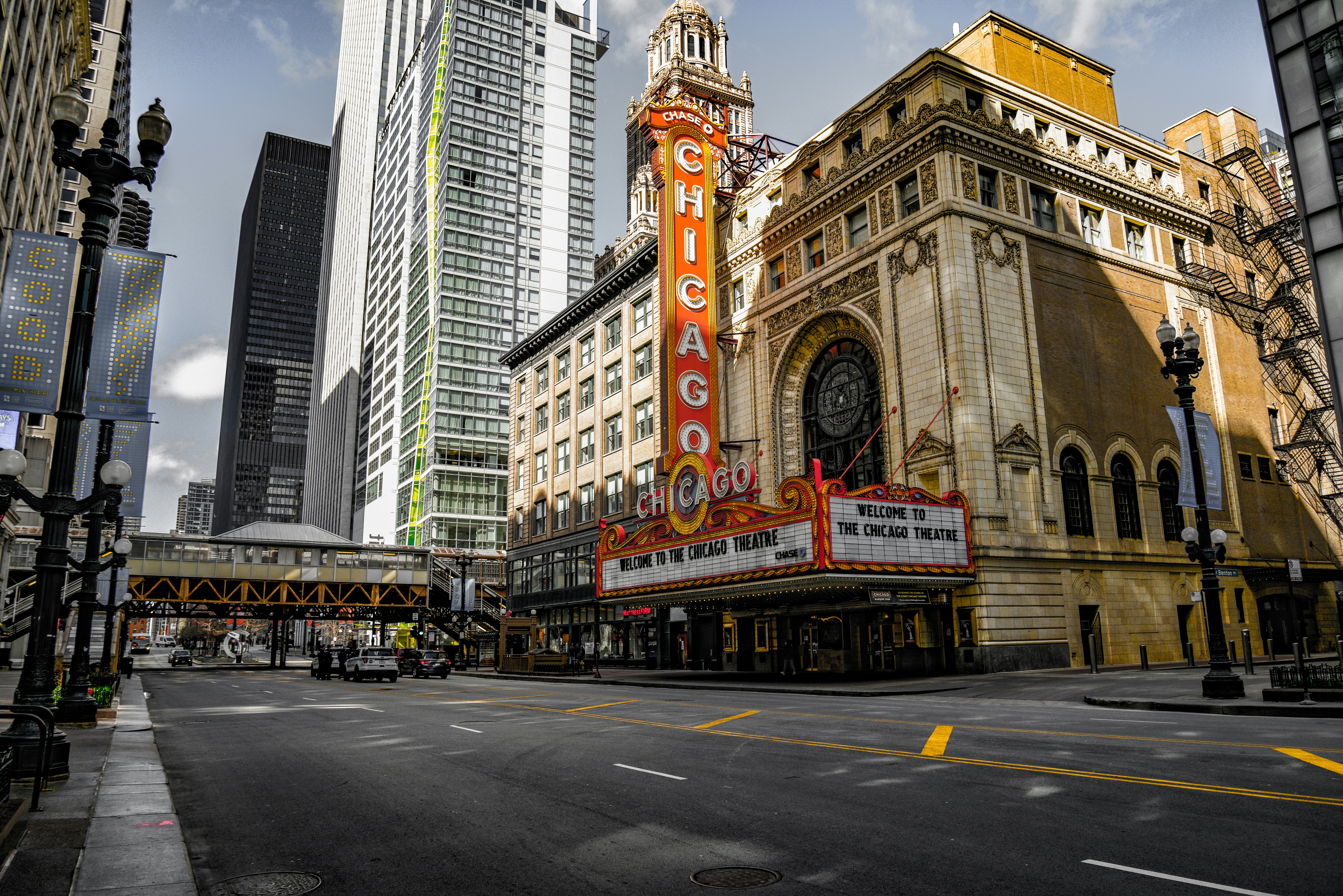 brown and white concrete building during daytime, Chicago Theatre