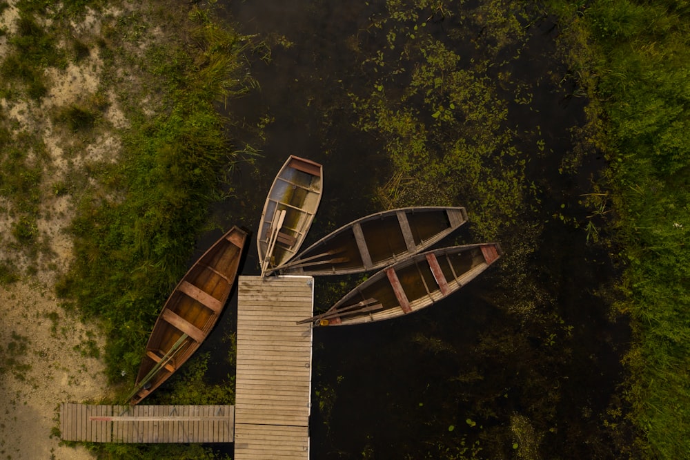 brown wooden bridge over river